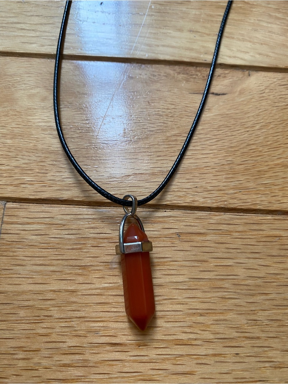 Red Carnelian Point Pendant on Black Cord